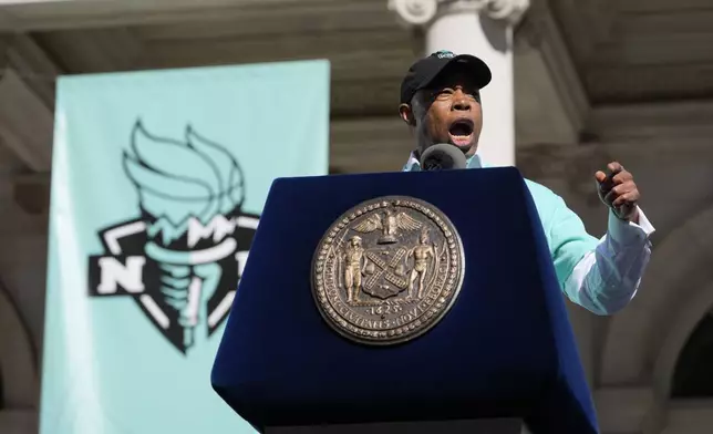 New York mayor Eric Adams speaks during a ceremony after a parade in honor of the Liberty's WNBA basketball championship at City Hall in New York, Thursday, Oct. 24, 2024. (AP Photo/Seth Wenig)