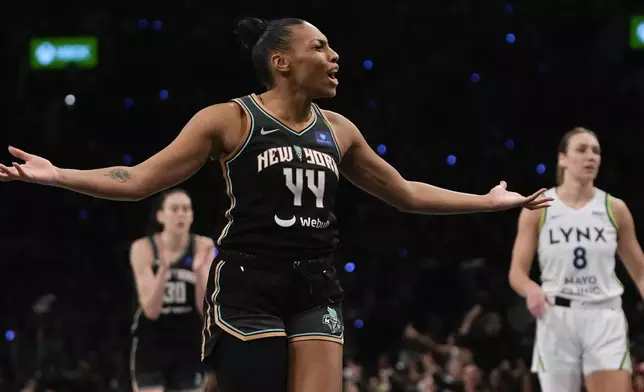 New York Liberty forward Betnijah Laney-Hamilton (44) reacts during the second quarter of Game 5 of the WNBA basketball final series against the Minnesota Lynx, Sunday, Oct. 20, 2024, in New York. (AP Photo/Pamela Smith)