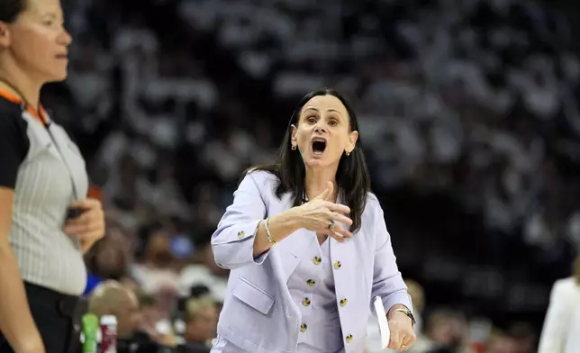 New York Liberty head coach Sandy Brondello reacts to a call during the first half against the Minnesota Lynx in Game 3 of a WNBA basketball final playoff series, Wednesday, Oct. 16, 2024, in Minneapolis. (AP Photo/Abbie Parr)