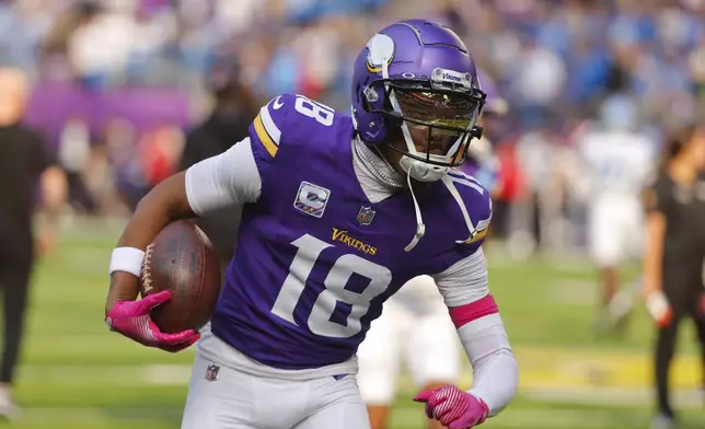 Minnesota Vikings wide receiver Justin Jefferson warms up before an NFL football game against the Detroit Lions Sunday, Oct. 20, 2024, in Minneapolis. (AP Photo/Bruce Kluckhohn)