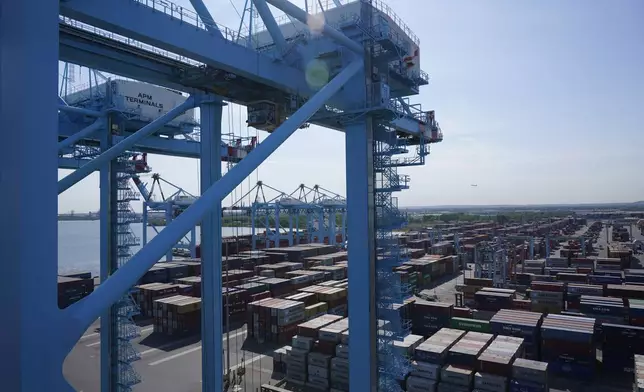 FILE - Shipping containers are stacked in the Port of New York and New Jersey in Elizabeth, N.J., May 20, 2021. (AP Photo/Seth Wenig, File)