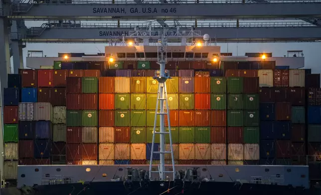 FILE - Ship to shore cranes work the container ship CMA CGM Laperouse at the Georgia Ports Authority's Port of Savannah, Sept. 29, 2021, in Savannah, Ga. (AP Photo/Stephen B. Morton, File)