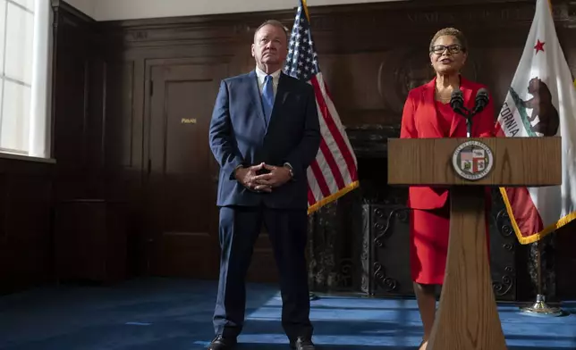 Los Angeles Mayor Karen Bass, right, introduces newly appointed police chief Jim McDonnell during a news conference in Los Angeles, Friday, Oct. 4, 2024. (AP Photo/Jae C. Hong)