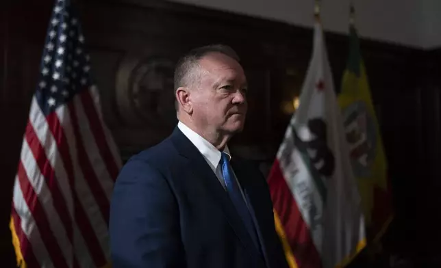 Newly appointed Los Angeles Police Chief Jim McDonnell listens during a news conference in Los Angeles, Friday, Oct. 4, 2024. (AP Photo/Jae C. Hong)