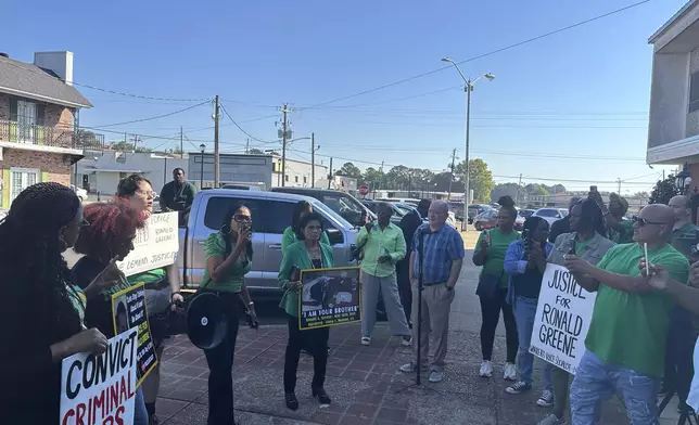 Supporters and family members of Ronald Greene gathered outside the Union Parish Courthouse, Monday, Oct. 28, 2024, in Farmerville, La., following a plea hearing and sentencing for former state trooper Kory York. Greene’s mother, Mona Hardin, objected to the plea as “unfair” and urged a judge to reject it. (AP Photo/Jim Mustian)