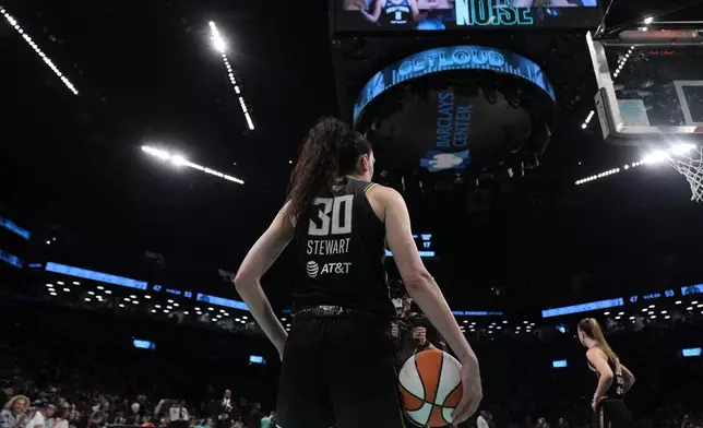 New York Liberty's Breanna Stewart stands on the court during the second half in Game 2 of a WNBA basketball final playoff series against the Minnesota Lynx, Sunday, Oct. 13, 2024, in New York. (AP Photo/Pamela Smith)