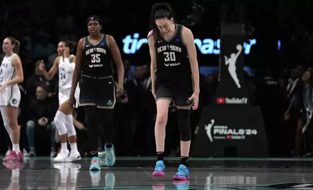 New York Liberty's Breanna Stewart (30) reacts after missing a free throw during the second half in Game 1 of a WNBA basketball final playoff series against the Minnesota Lynx, Thursday, Oct. 10, 2024, in New York. (AP Photo/Pamela Smith)