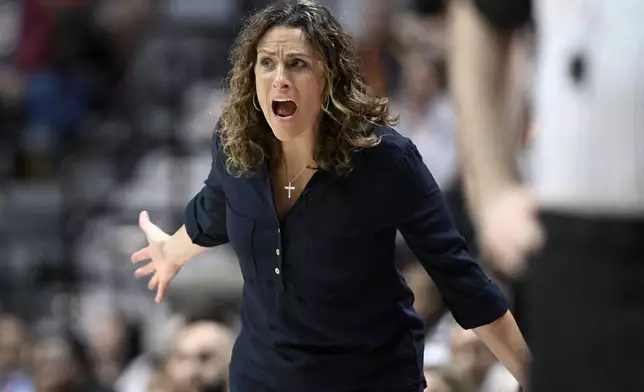 Connecticut Sun head coach Stephanie White reacts during the first half of a WNBA basketball semifinal game against the Minnesota Lynx, Friday, Oct. 4, 2024, in Uncasville, Conn. (AP Photo/Jessica Hill)