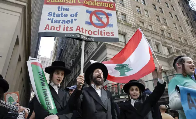 Pro-Palestinian Orthodox Jews demonstrate during a protest, Monday, Oct. 7, 2024, in New York. (AP Photo/Stefan Jeremiah)