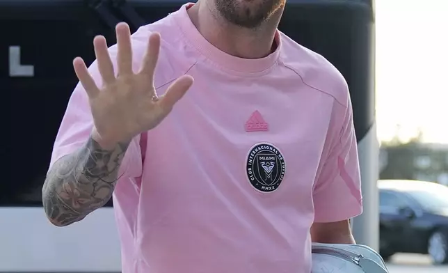 Inter Miami forward Lionel Messi waves as he arrives for an MLS soccer match against Charlotte FC, Saturday, Sept. 28, 2024, in Fort Lauderdale, Fla. (AP Photo/Rebecca Blackwell)