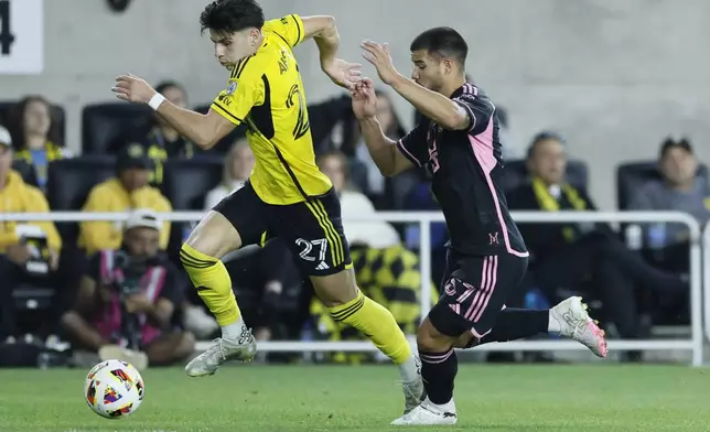 Inter Miami's Marcelo Weigandt, right, chases Columbus Crew's Maximilian Arfsten during the first half of an MLS soccer match Wednesday, Oct. 2, 2024, in Columbus, Ohio. (AP Photo/Jay LaPrete)