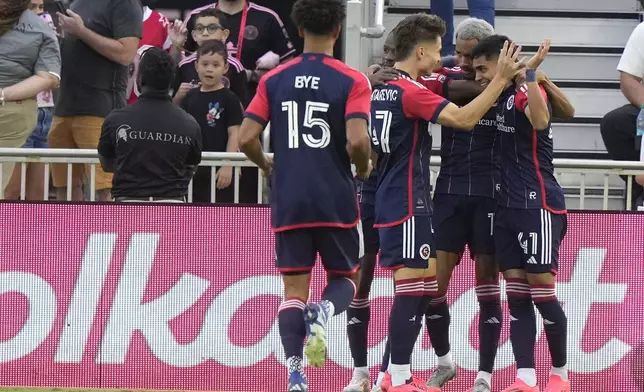 New England Revolution forward Luca Langoni (41) celebrates after scoring a goal during the first half of an MLS soccer match against Inter Miami, Saturday, Oct. 19, 2024, in Fort Lauderdale, Fla. (AP Photo/Lynne Sladky)