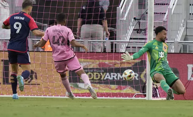 The ball gets past Inter Miami goalkeeper Drake Callender on a goal scored by New England Revolution forward Luca Langoni during the first half of an MLS soccer match, Saturday, Oct. 19, 2024, in Fort Lauderdale, Fla. (AP Photo/Lynne Sladky)