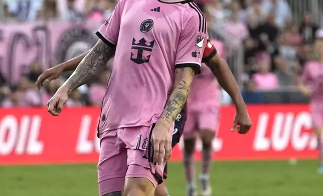 Inter Miami midfielder Robert Taylor heads the ball during the first half of an MLS soccer match against the New England Revolution, Saturday, Oct. 19, 2024, in Fort Lauderdale, Fla. (AP Photo/Lynne Sladky)