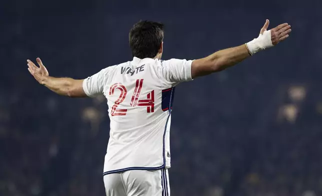 Vancouver Whitecaps forward Brian White, reacts to a foul call against the Portland Timbers during the first half of an MLS soccer match Wednesday, Oct. 23, 2024, in Portland, Ore. (AP Photo/Howard Lao)