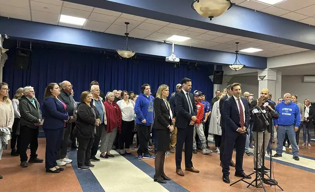 Attorney Ben Gideon speaks at a news conference in Lewiston, Maine, on Tuesday, Oct. 15, 2024, along with victims of the 2023 Lewiston mass shooting. (AP Photo/Patrick Whittle)