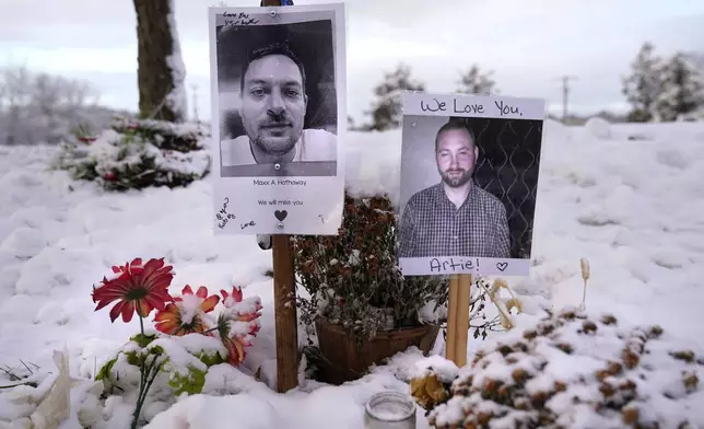 FILE - Pictures of two of the victims of the October 2023 mass shooting by Army reservist Robert Card are seen at a makeshift memorial in Lewiston, Maine, in this Dec. 5, 2023 file photo. (AP Photo/Robert F. Bukaty, File)