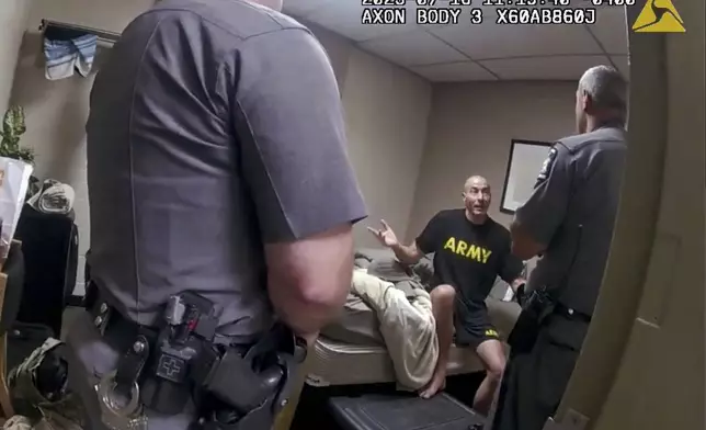 FILE — In this image taken from New York State Police body camera video that was obtained by WMTW-TV 8 in Portland, Maine, New York State Police interview Army reservist Robert Card, the man responsible for Maine's deadliest mass shooting, at Camp Smith, in Cortlandt, N.Y., July 16, 2023. (WMTW-TV 8/New York State Police via AP, File)