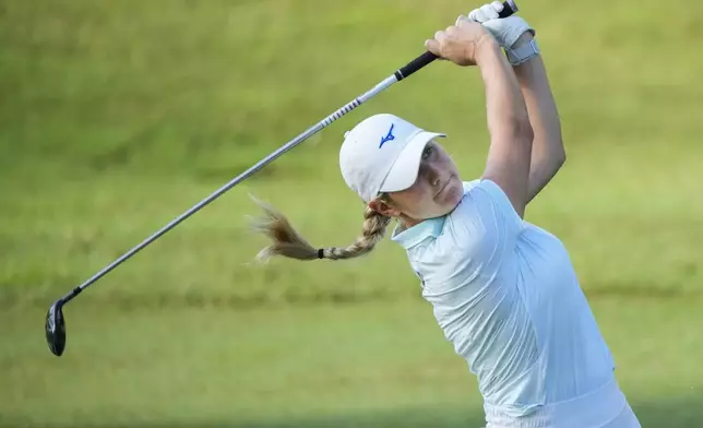 Bailey Tardy of the United States watches her fairway shot on the third hole during the second round of Maybank LPGA Championship golf tournament at Kuala Lumpur Golf and Country club in Kuala Lumpur, Friday, Oct. 25, 2024. (AP Photo/Vincent Thian)