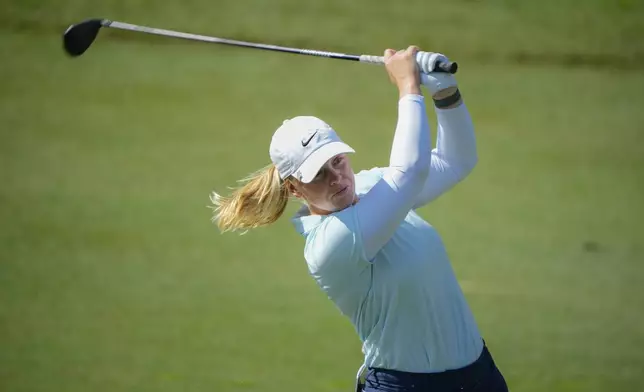 Maja Stark of Sweden watches her fairway shot on the third hole during the second round of Maybank LPGA Championship golf tournament at Kuala Lumpur Golf and Country club in Kuala Lumpur, Thursday, Oct. 24, 2024. (AP Photo/Vincent Thian)