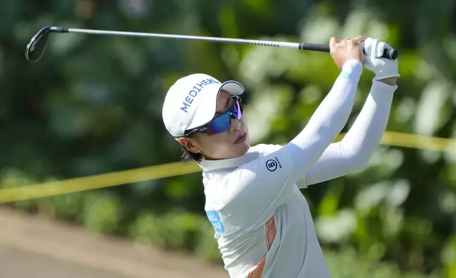 Narin An of South Korea's watches her fairway shot on the third hole during the second round of Maybank LPGA Championship golf tournament at Kuala Lumpur Golf and Country club in Kuala Lumpur, Thursday, Oct. 24, 2024. (AP Photo/Vincent Thian)