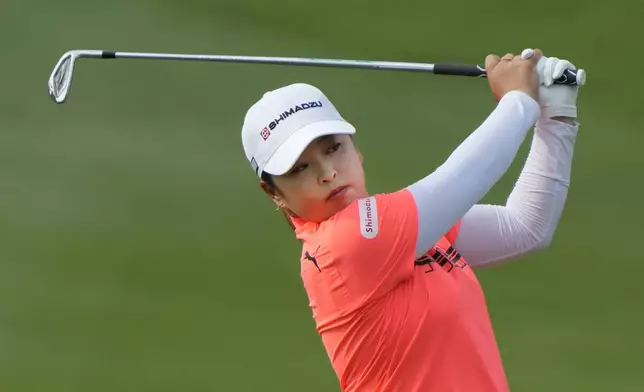 Mao Saigo of Japan watches her shot on the 3th fairway during the first round of Maybank LPGA Championship golf tournament at Kuala Lumpur Golf and Country club in Kuala Lumpur, Thursday, Oct. 24, 2024. (AP Photo/Vincent Thian)