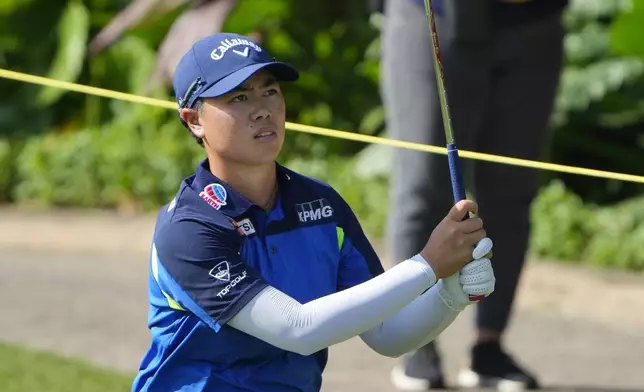 Yuka Saso of Japan watches her fairway shot on the third hole during the second round of Maybank LPGA Championship golf tournament at Kuala Lumpur Golf and Country club in Kuala Lumpur, Thursday, Oct. 24, 2024. (AP Photo/Vincent Thian)