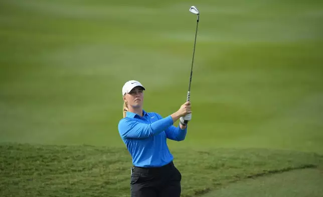 Maja Stark of Sweden hits from a fairway at the 2nd fairway during the first round of Maybank LPGA Championship golf tournament at Kuala Lumpur Golf and Country club in Kuala Lumpur, Thursday, Oct. 24, 2024. (AP Photo/Vincent Thian)