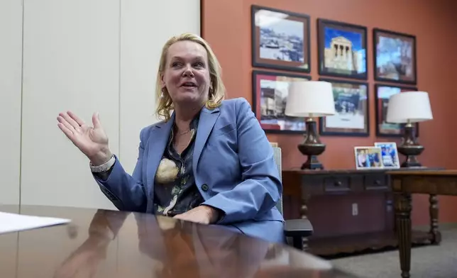 April McClain-Delaney, Democratic candidate for Maryland's Sixth Congressional District, speaks during an interview with The Associated Press, Thursday, Oct. 10, 2024, in Gaithersburg, Md. (AP Photo/Stephanie Scarbrough)