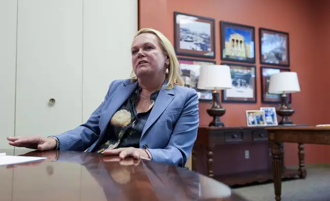 April McClain-Delaney, Democratic candidate for Maryland's Sixth Congressional District, speaks during an interview with The Associated Press, Thursday, Oct. 10, 2024, in Gaithersburg, Md. (AP Photo/Stephanie Scarbrough)