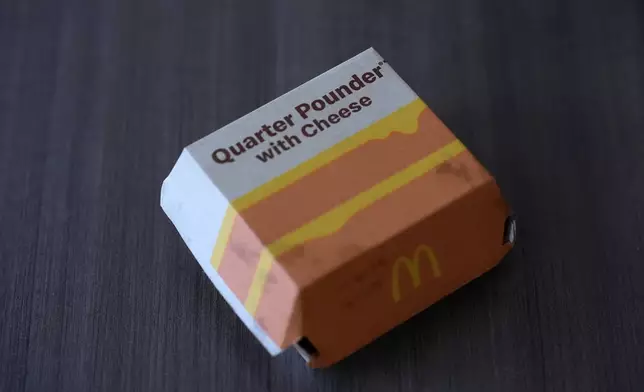 Pictured is a McDonald's Quarter Pounder sandwich box purchased Wednesday, Oct. 23, 2024, in Chicago. (AP Photo/Charles Rex Arbogast)