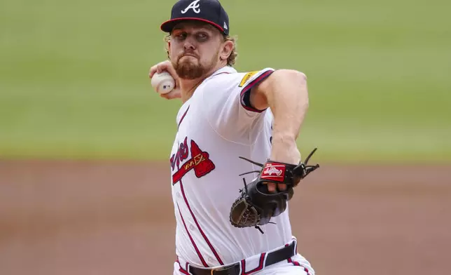 Atlanta Braves pitcher Spencer Schwellenbach throws in the first inning of a baseball game against the New York Mets, Monday, Sept. 30, 2024, in Atlanta. (AP Photo/Jason Allen)