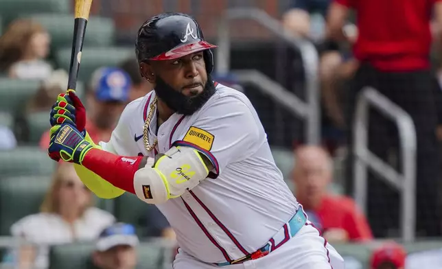 Atlanta Braves' Marcell Ozuna waits for the pitch in the fifth inning of a baseball game against the New York Mets, Monday, Sept. 30, 2024, in Atlanta. (AP Photo/Jason Allen)