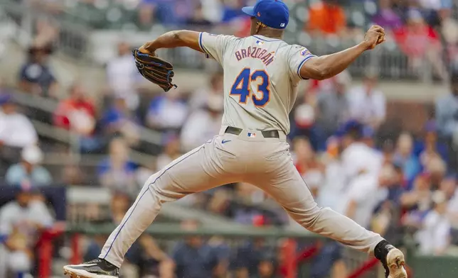 New York Mets pitcher Huascar Brazoban throws in the sixth inning of a baseball game against the Atlanta Braves, Monday, Sept. 30, 2024, in Atlanta. (AP Photo/Jason Allen)