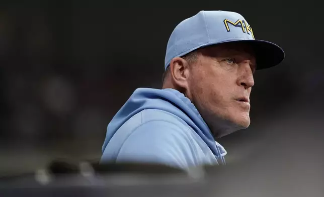 Milwaukee Brewers manager Pat Murphy looks from the dugout during the third inning of a baseball game against the New York Mets, Friday, Sept. 27, 2024, in Milwaukee. (AP Photo/Aaron Gash)