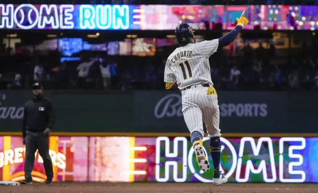 Milwaukee Brewers' Jackson Chourio hits a home run during the first inning of Game 2 of a National League wild card baseball game against the New York Mets Wednesday, Oct. 2, 2024, in Milwaukee. (AP Photo/Morry Gash)