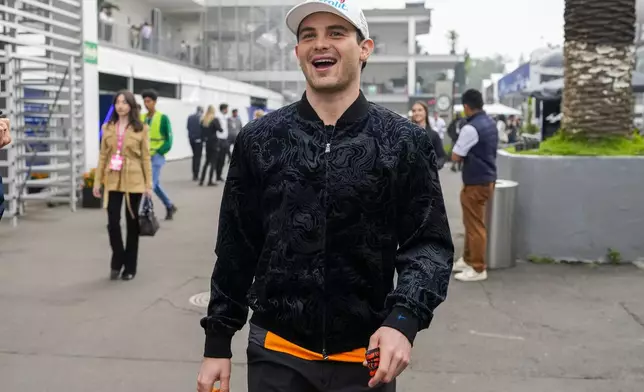 McLaren driver Pato O'Ward, of Mexico, arrives for the first free practice ahead of the Formula One Mexico Grand Prix auto race, at the Hermanos Rodriguez racetrack in Mexico City, Friday, Oct. 25, 2024. (AP Photo/Moises Castillo)