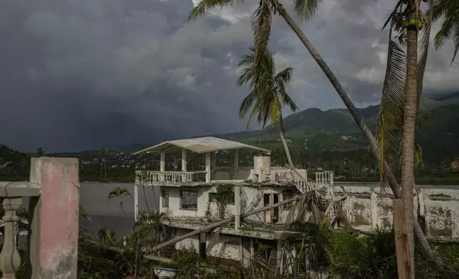 A house lies damaged after the impact of Hurricane John, in Pie de la Cuesta, Guerrero state, Mexico, Monday, Sept. 30, 2024. (AP Photo/Felix Marquez)