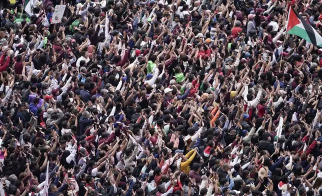 Supporters listen to President Claudia Sheinbaum during a rally in the Zócalo, Mexico City's main square, on her inauguration day, Tuesday, Oct. 1, 2024. (AP Photo/Aurea Del Rosario)