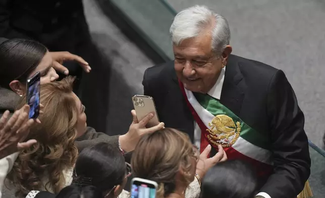 Outgoing President Andrés Manuel López Obrador arrives at Congress for the swearing-in of Claudia Sheinbaum as Mexico's new president in Mexico City, Tuesday, Oct. 1, 2024. (AP Photo/Fernando Llano)