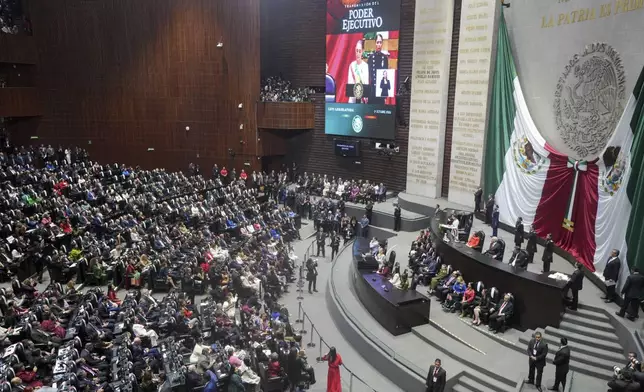 President Claudia Sheinbaum speaks on her inauguration day after being sworn in at Congress in Mexico City, Tuesday, Oct. 1, 2024. (AP Photo/Fernando Llano)