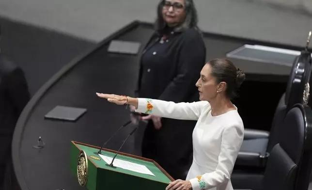 Claudia Sheinbaum takes the oath as Mexico's new president at Congress in Mexico City, Tuesday, Oct. 1, 2024. (AP Photo/Fernando Llano)