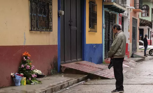 A man prays in front of an altar where Catholic priest Marcelo Perez was killed in an armed attack after attending mass at a church in San Cristobal de las Casas, Chiapas state, Mexico, Sunday, Oct. 20, 2024. (AP Photo/Isabel Mateos)