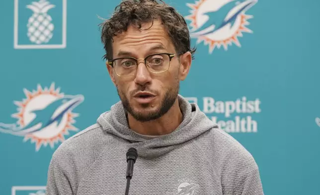 Miami Dolphins head coach Mike McDaniel speaks during a news conference at the team's training facility, Wednesday, Oct. 23, 2024, in Miami Gardens, Fla. (AP Photo/Marta Lavandier)