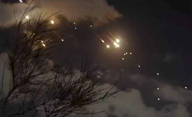 In this image taken from video shows projectiles being intercepted over Jerusalem, Israel, Tuesday, Oct. 1, 2024. (AP Photo)