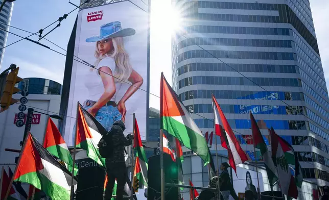 Demonstrators protest in support of the Palestinian people, Saturday, Oct. 5, 2024, in Toronto, days before the one-year anniversary of Hamas' attack in southern Israel and Israel's response to go to war on Hamas. (Arlyn McAdorey/The Canadian Press via AP)