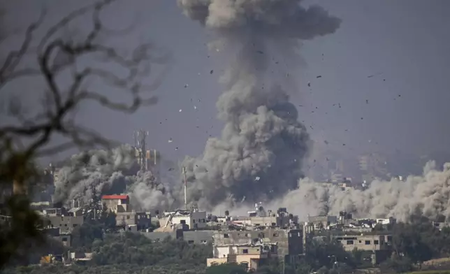 FILE - Smoke rises following an Israeli airstrike in the Gaza Strip, as seen from southern Israel, Monday, Oct. 23, 2023. (AP Photo/Ariel Schalit, File)