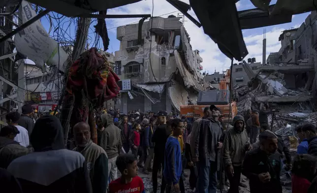 FILE - Palestinians check destruction after an Israeli strike in Rafah, Gaza Strip, Monday, March 4, 2024. (AP Photo/Fatima Shbair, File)