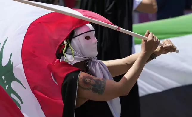 Pro-Palestinian protesters demonstrate in Quito, Ecuador, Saturday, Oct. 5, 2024. (AP Photo/Dolores Ochoa)