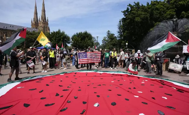 Pro-Palestinian supporters rally in Sydney, Sunday, Oct. 6, 2024. (AP Photo/Rick Rycroft)